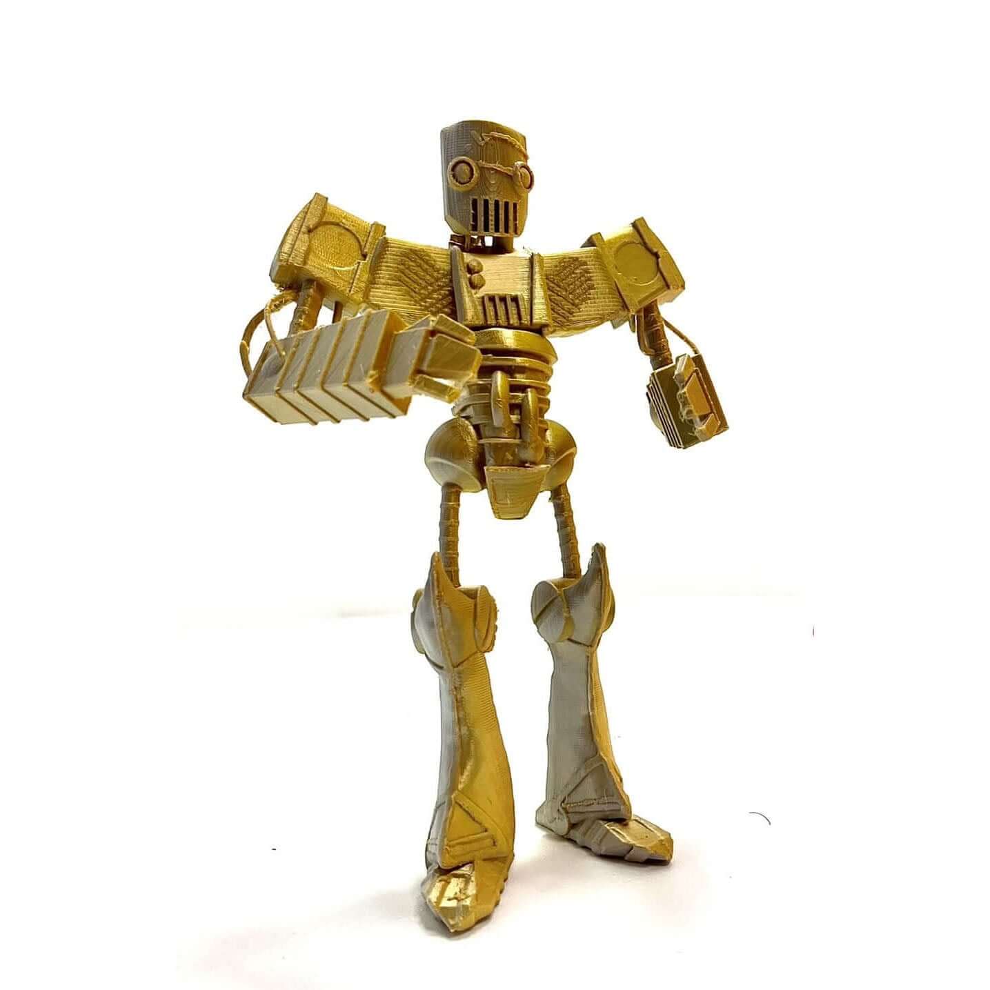 Charismatic Toby Bot bipedal robot, Iron Giant inspired desk protector and office decor, 3D-printed robot standing confidently.